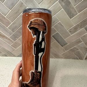 Brown Tumbler with Soldier Silhouette 20 oz epoxy tumbler. Has hints of glitter
